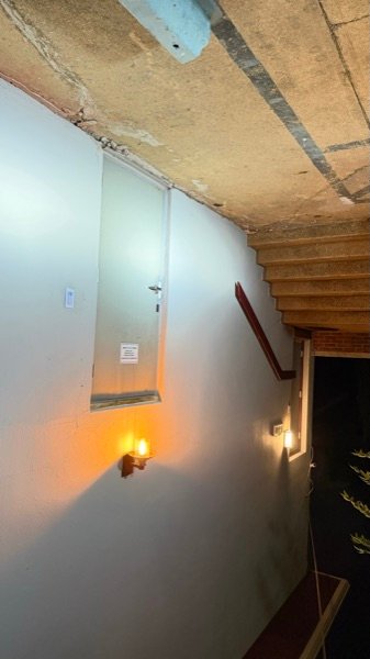 Second entry on the same site &mdash; suite door reader, same night, same finish.