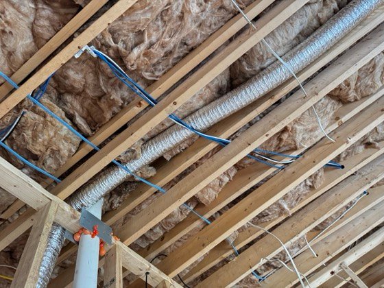 CAT6 and coax routed through the joists, supported and clear of the mechanical runs.
